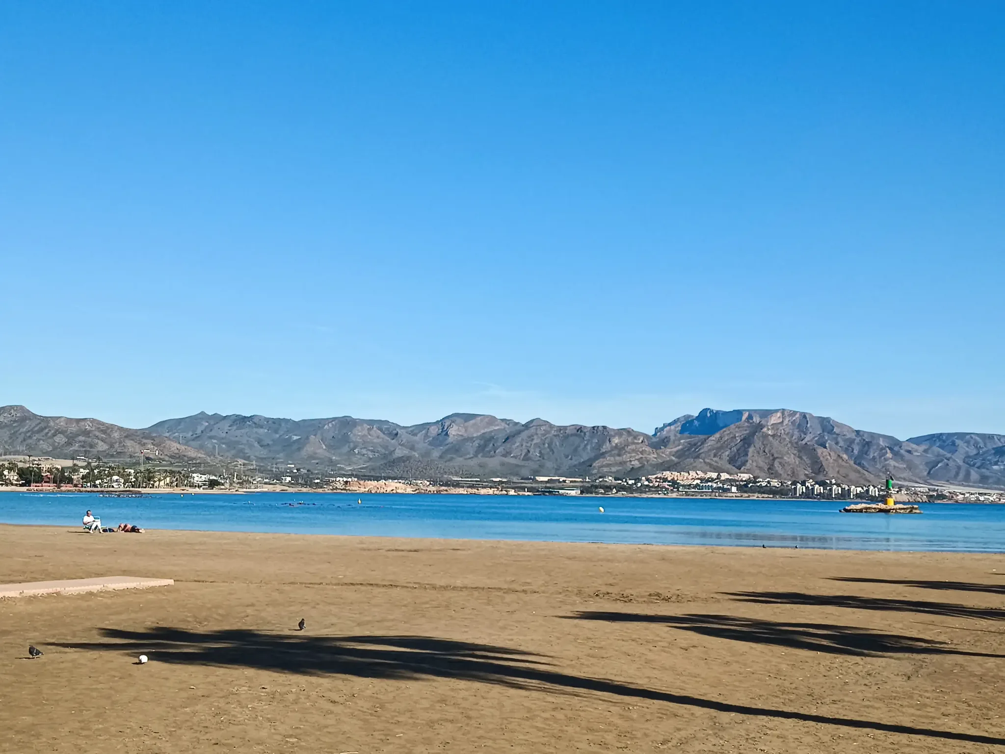 Wide sandy beach beside Puerto de Mazarrón