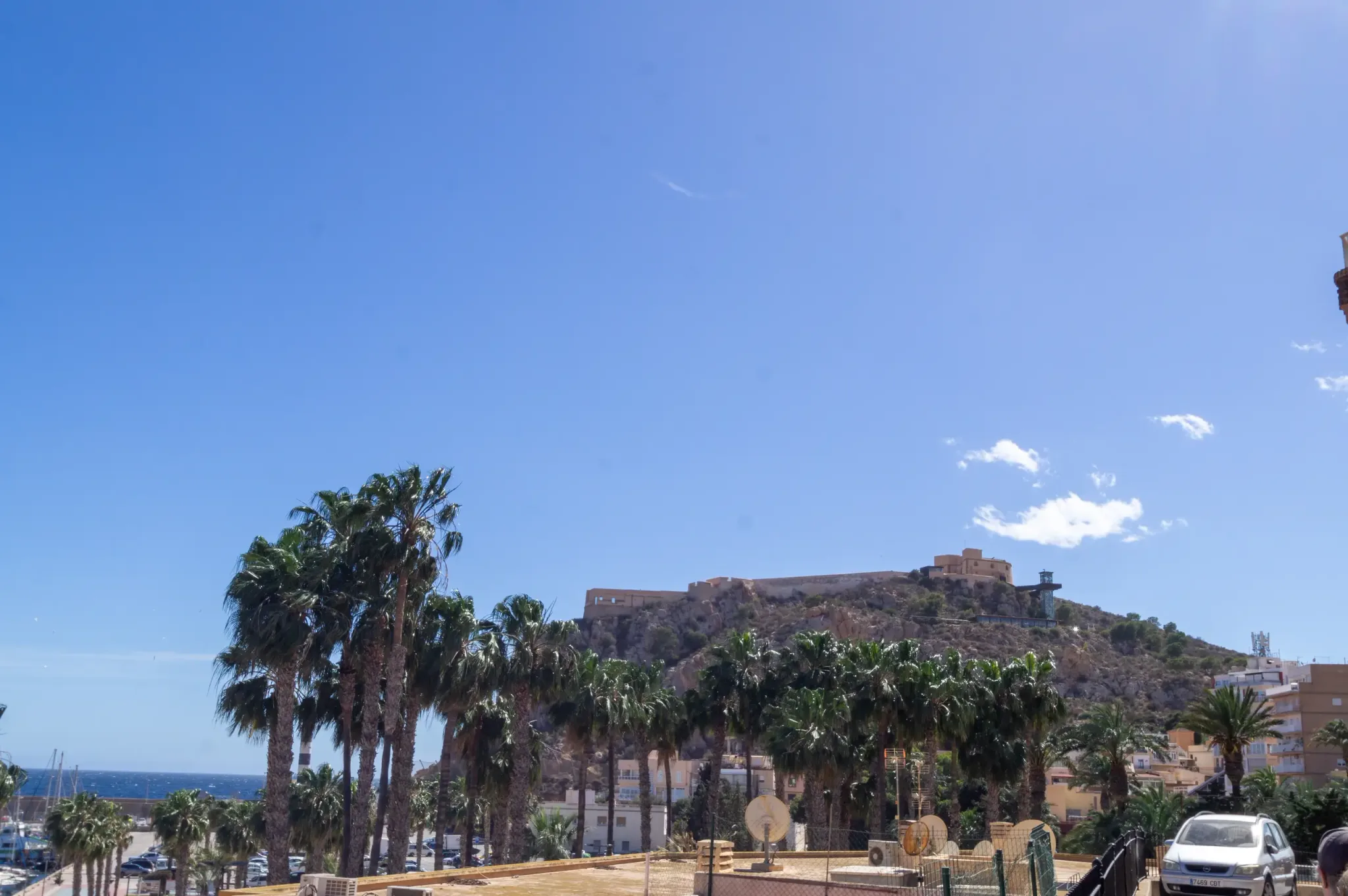 Castle of San Juan above palm trees in Águilas