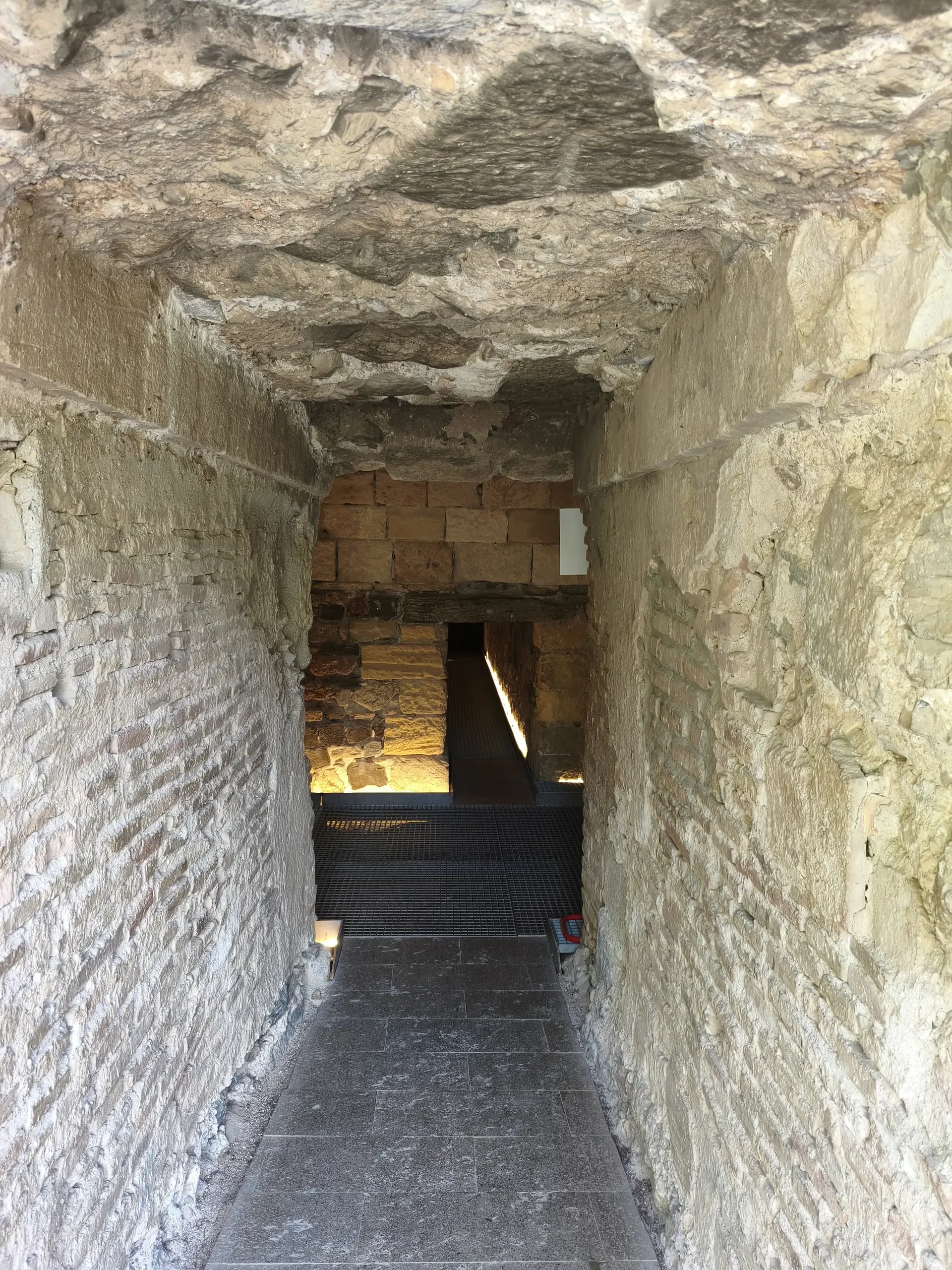 Narrow stone passage inside Concepción Castle
