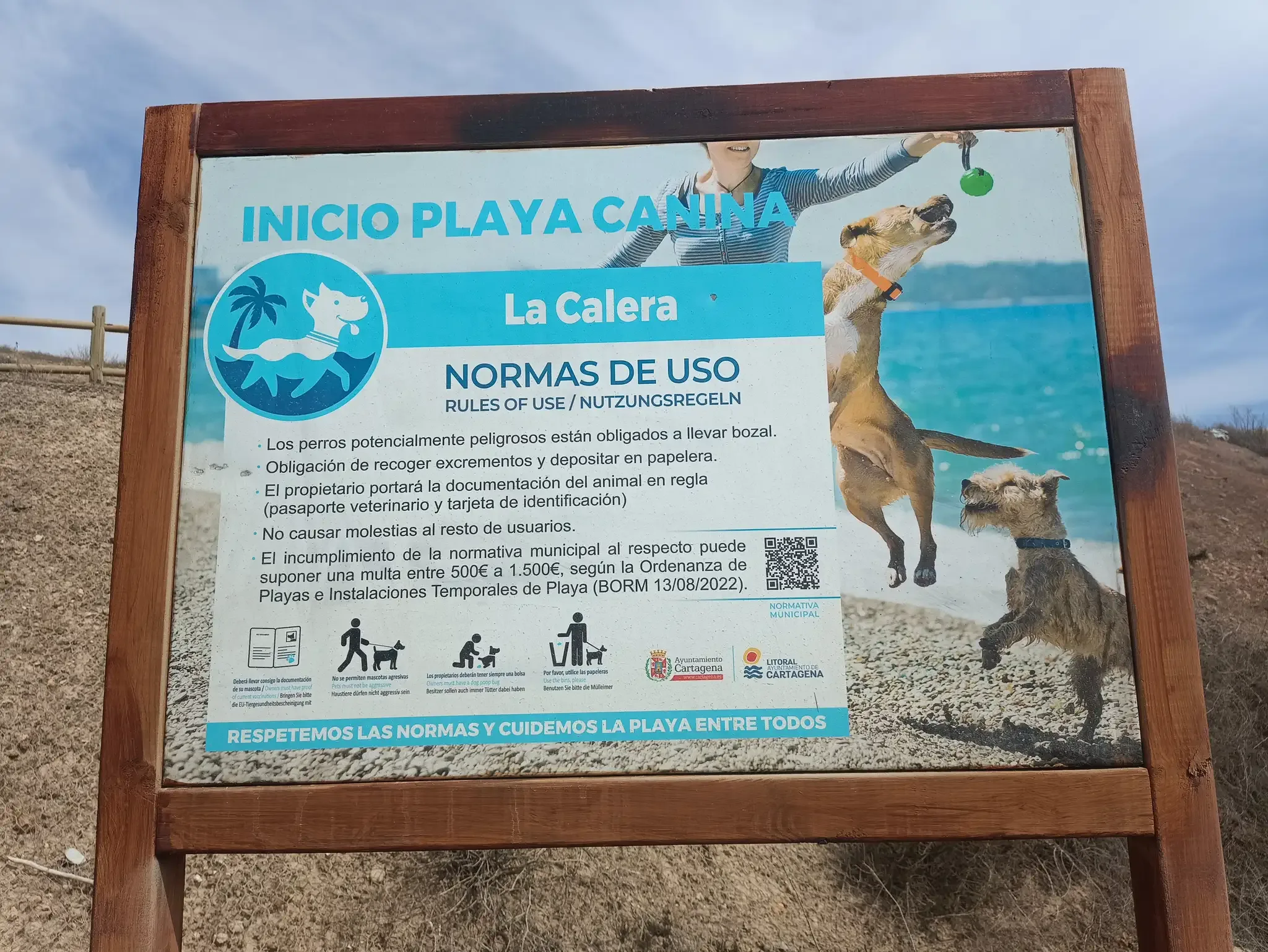 Rules sign at the entrance to La Calera dog-friendly beach