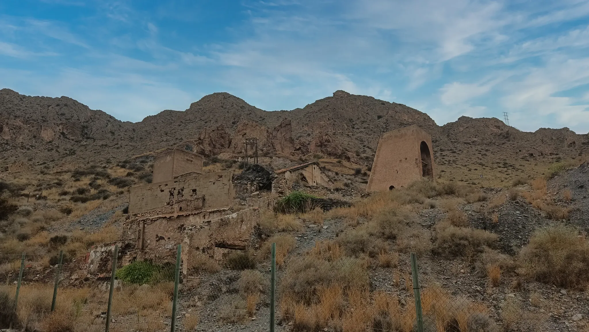 Historic mine buildings below the Sierra del Aguilón
