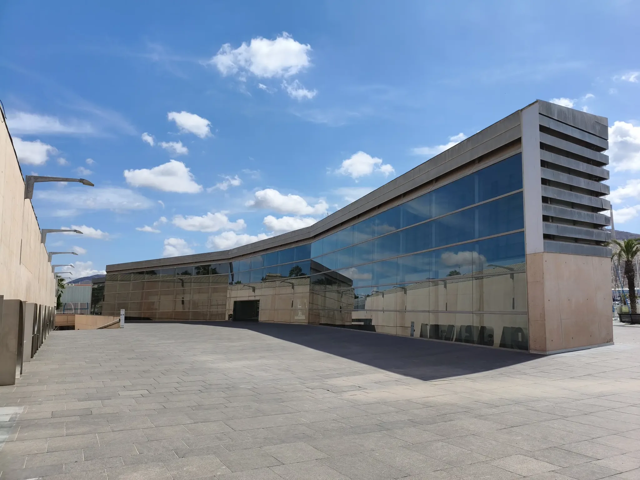Curved glass exterior of the National Museum of Underwater Archaeology