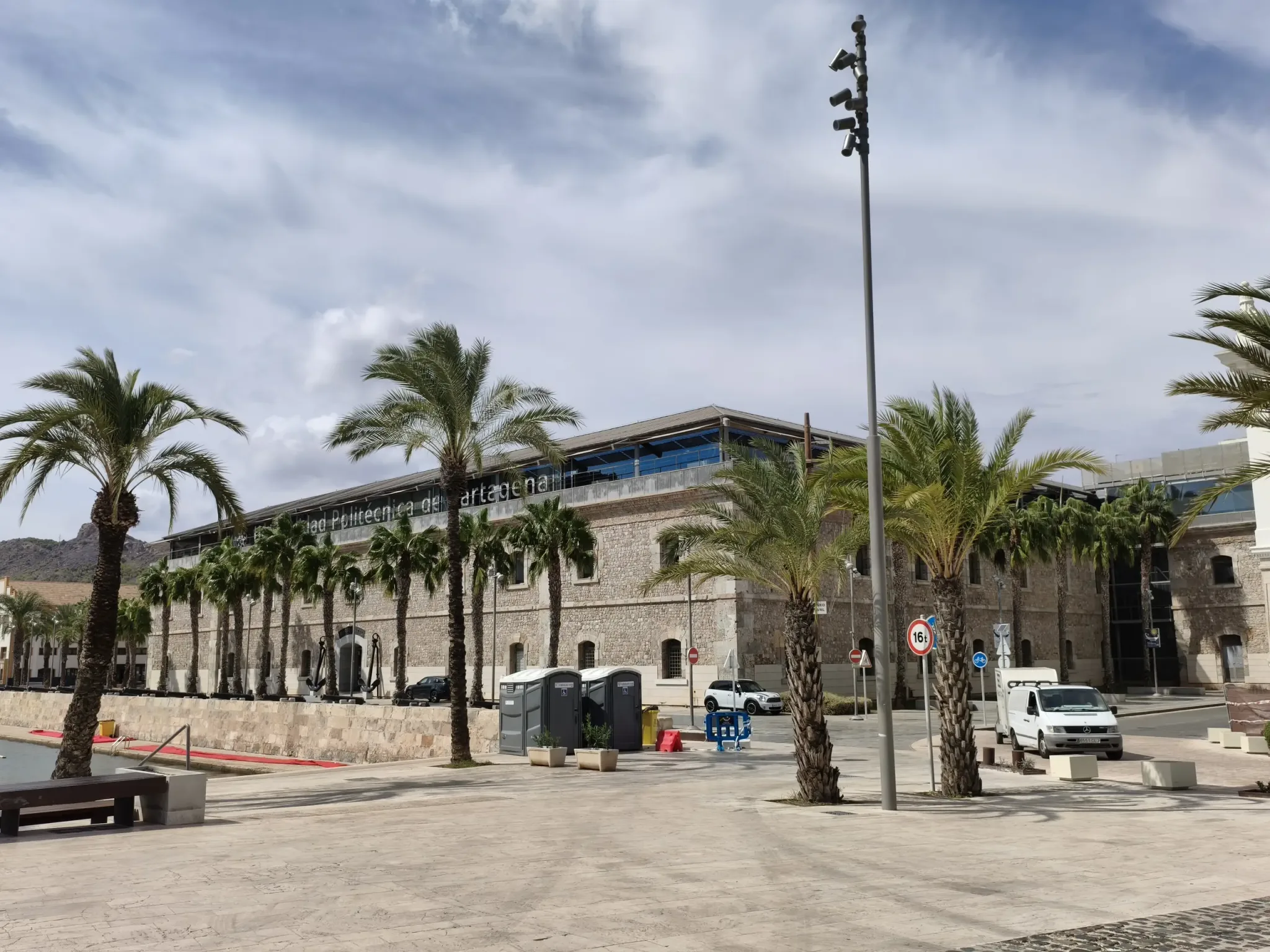 Naval Museum building and palm-lined public space beside Cartagena's waterfront