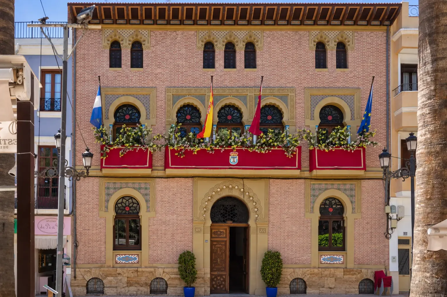 Decorated neo-Mudéjar town hall façade on Plaza de España