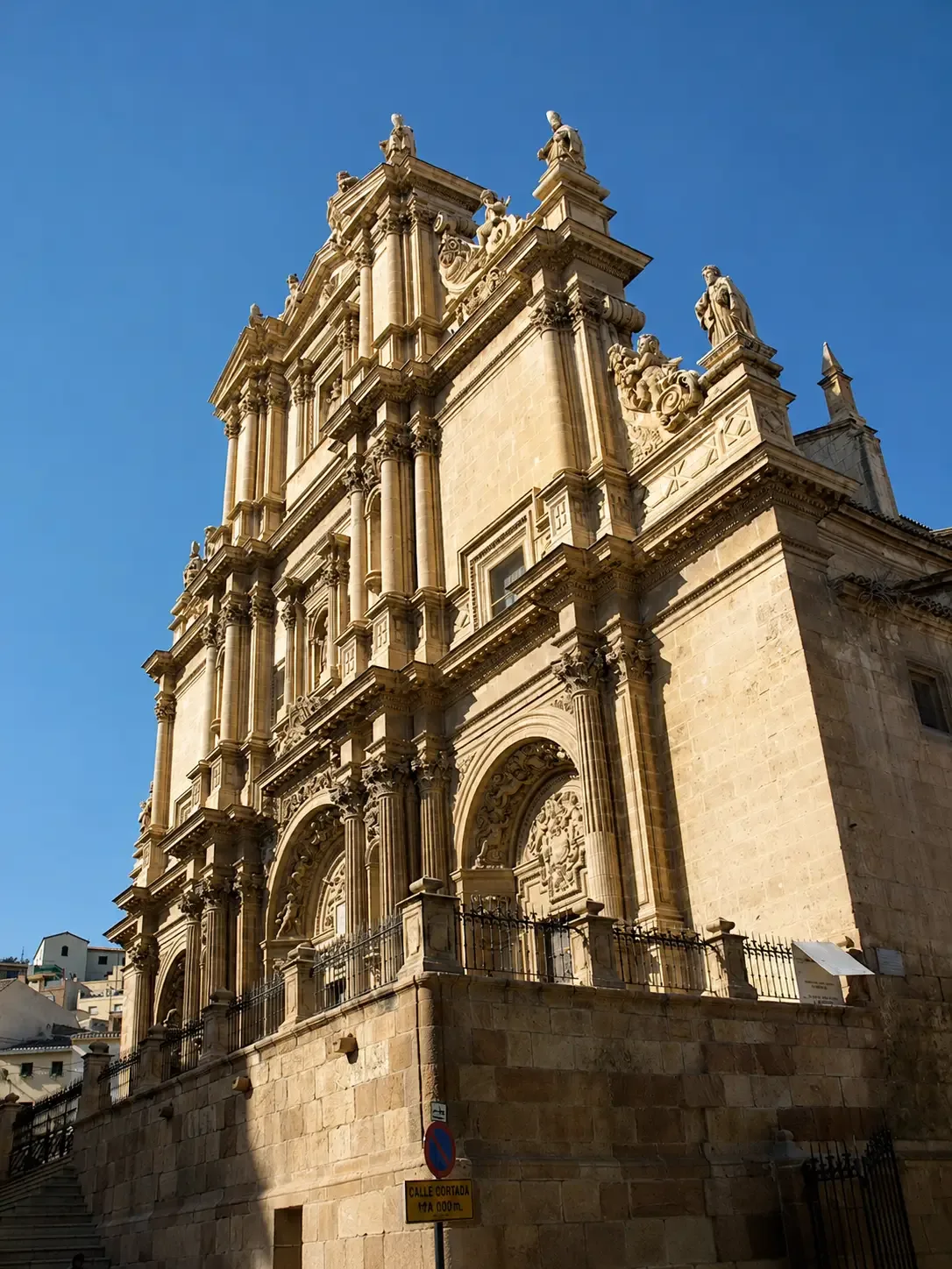 Carved columns and statues above the entrance to San Patricio Collegiate Church